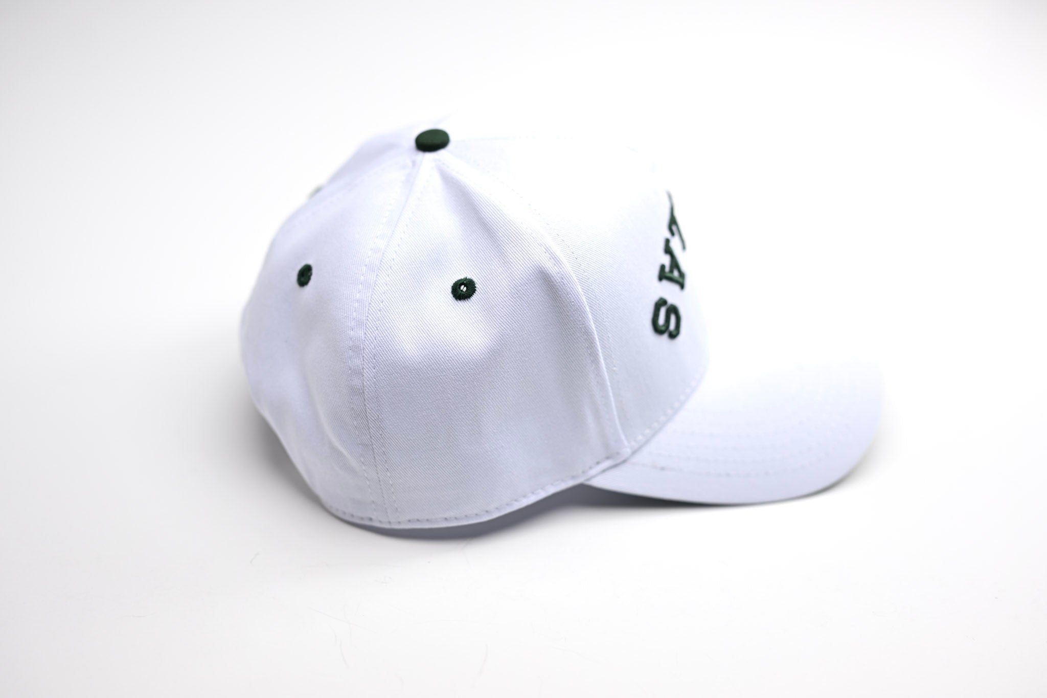Precurved Dallas snapback - WHITE w/ FOREST GREEN ACCENTS