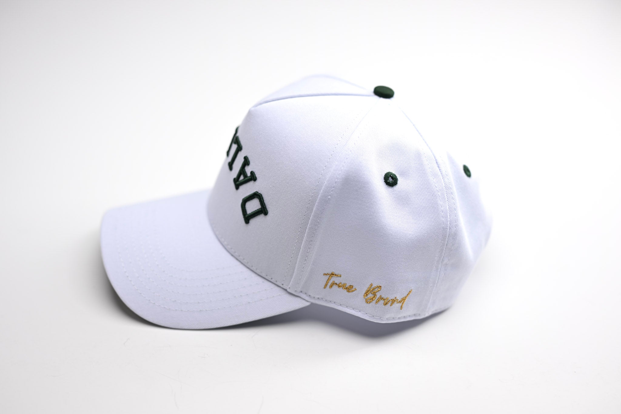 Precurved Dallas snapback - WHITE w/ FOREST GREEN ACCENTS
