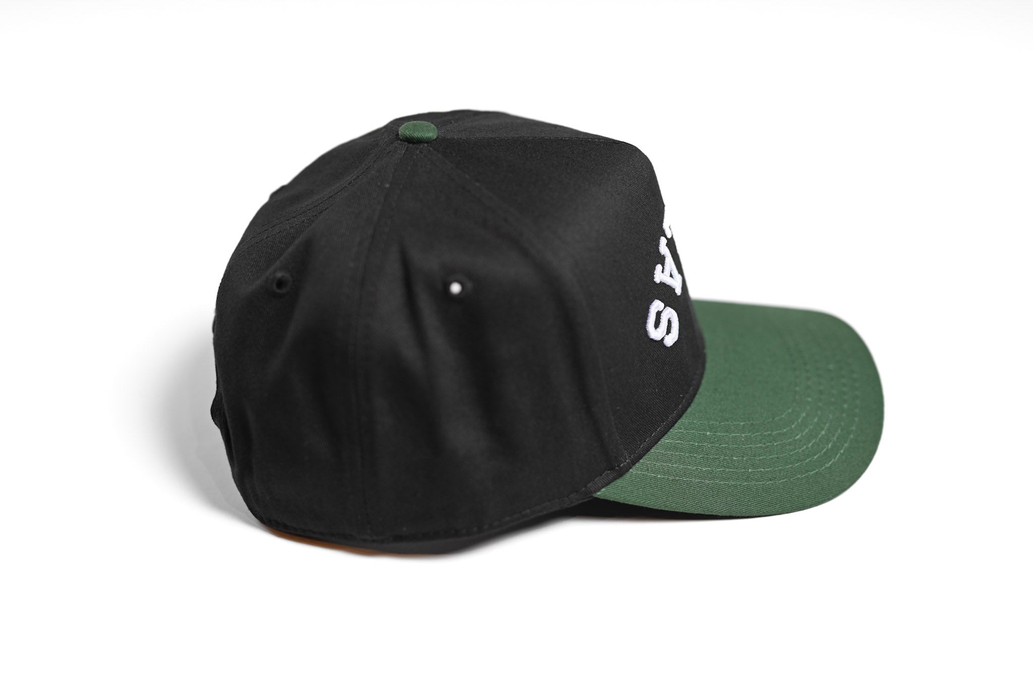 Human Courage Snap Back Hat/ Green under Brim